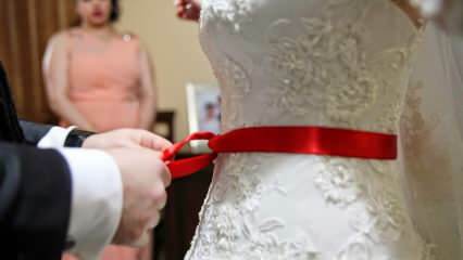 Apa arti dari pita merah? Mengapa sabuk merah diikat ke pengantin wanita?
