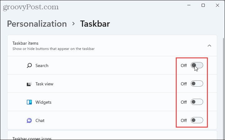 Sembunyikan item Taskbar di Windows 11
