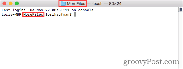 Jendela terminal terbuka ke folder di Mac