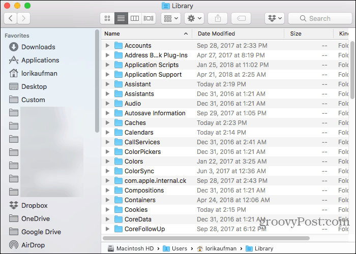 Folder perpustakaan di folder Beranda di Finder di Mac