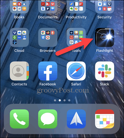 Tekan lama ikon di layar beranda iPhone