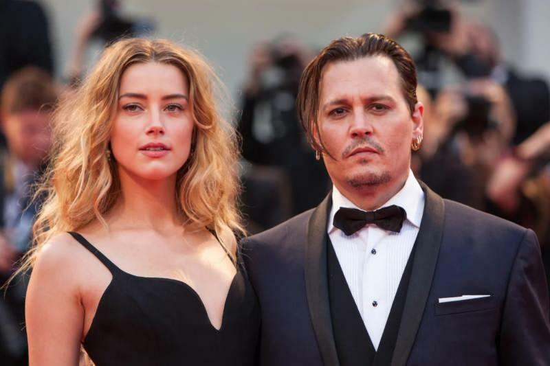 Johnny Depp dan mantan istrinya Amber Heard